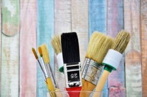 wood background paint brushes 